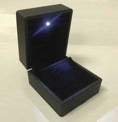 A black box with a light inside of it