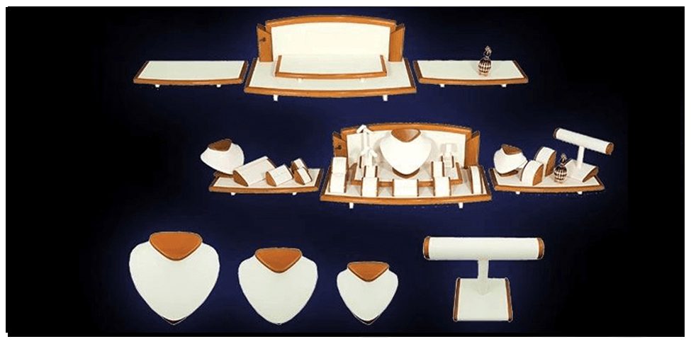 A set of jewelry displays in white and brown.