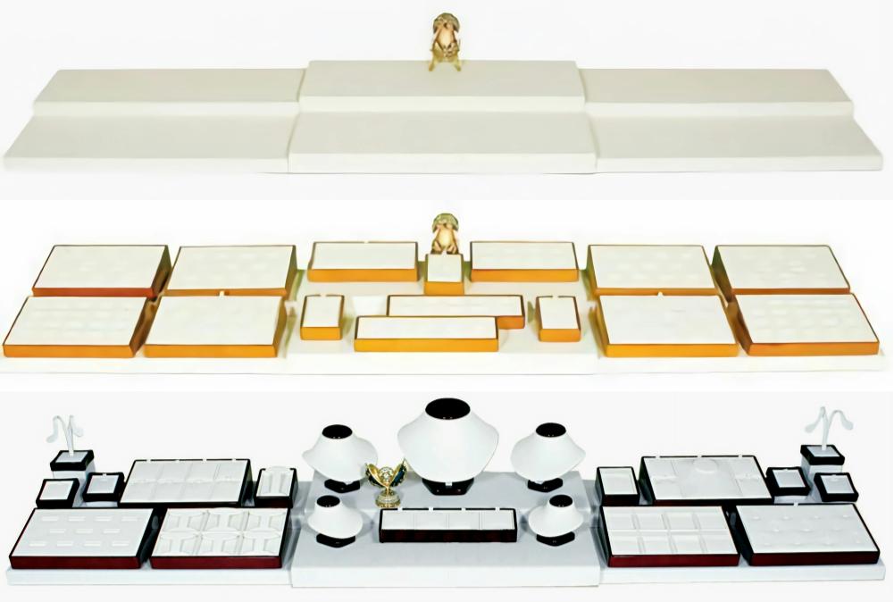 Three different sets of white and gold desk accessories.