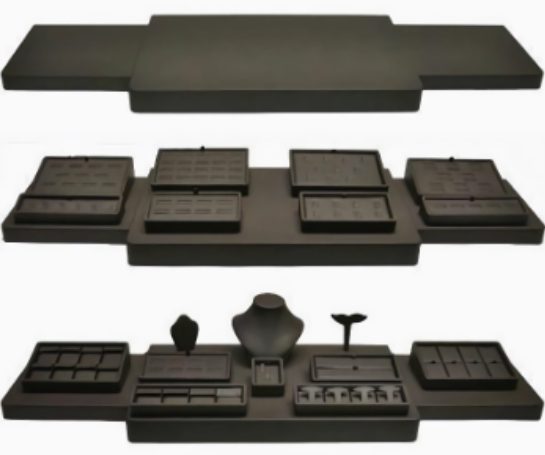 A set of three different keyboards and one keyboard holder.