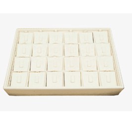 A tray with 2 4 white plastic trays in it.