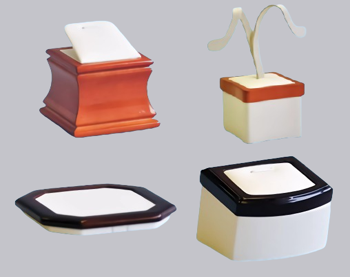 A collection of four different types of jewelry boxes.