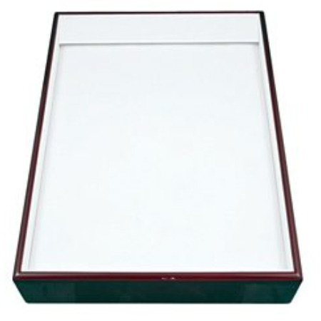 A white box with red trim on top of it.