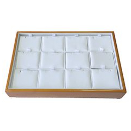 A tray with 1 2 white trays in it.