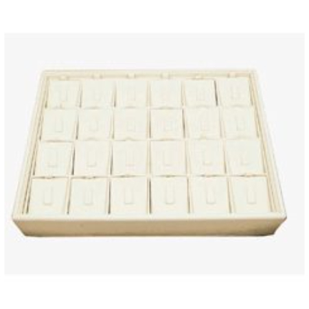 A tray of white blocks with the letters u and z written in them.