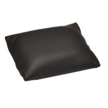 A black pillow is sitting on top of the floor.