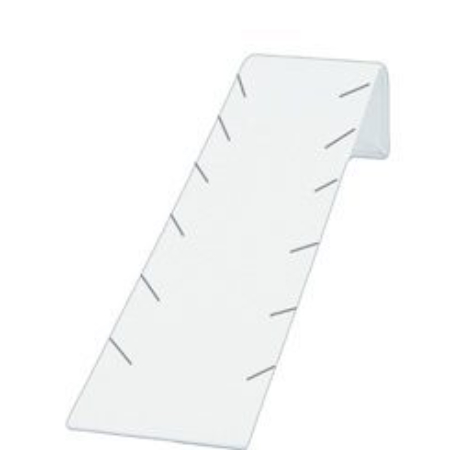 A white plastic board with holes for the top.