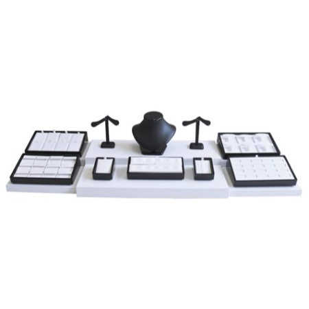 A set of four black and white desk accessories.