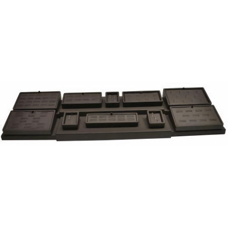 A black tray with many compartments on it