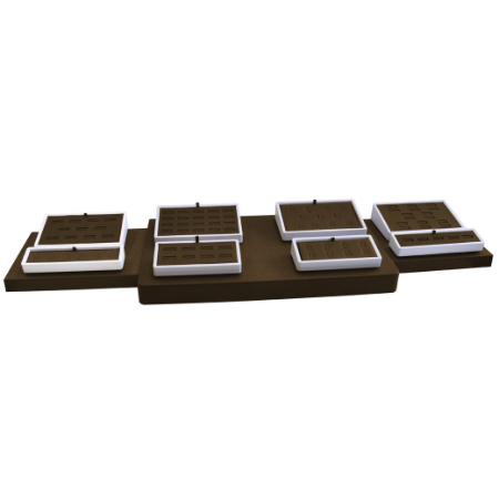 A set of four trays with lids on top.