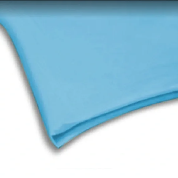 A close up of the corner of a blue sheet.